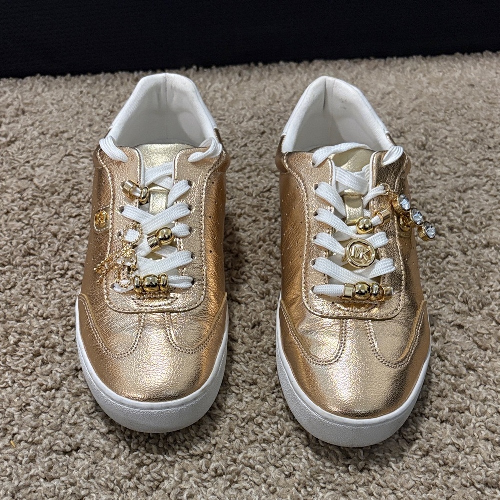 Michael Kors women’s Metallic Leather Gold Sneakers